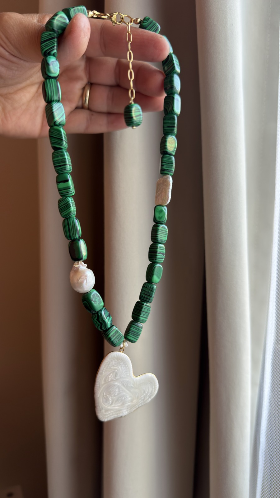 Handmade necklace with natural stones and shell detail
